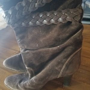 Dark brown suede boots.